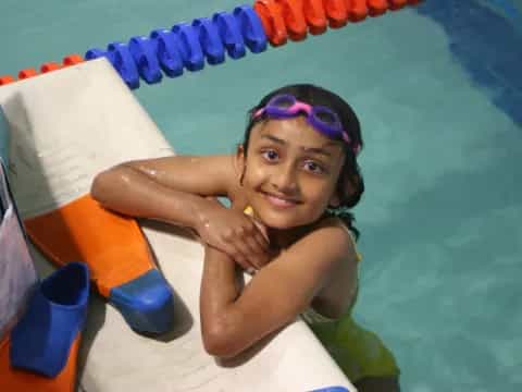a girl in a pool