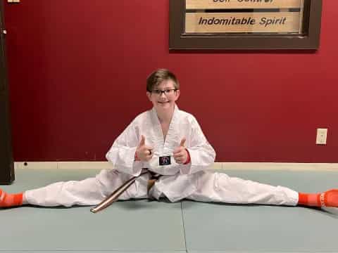 a man in a karate uniform