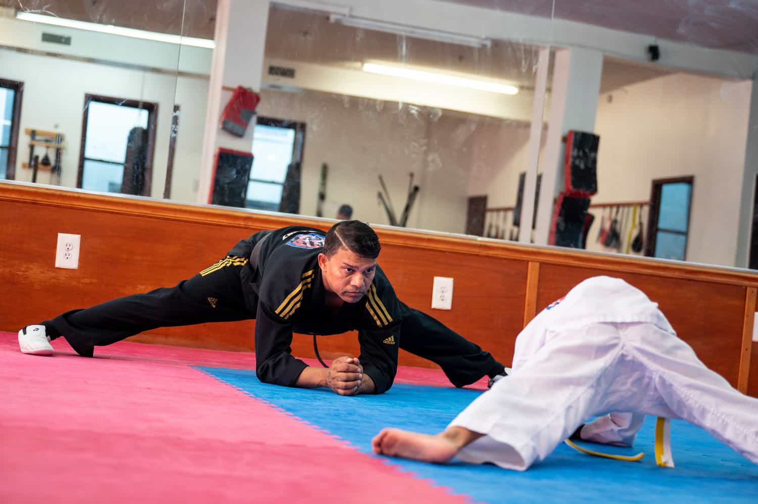 a person doing a plank on a mat