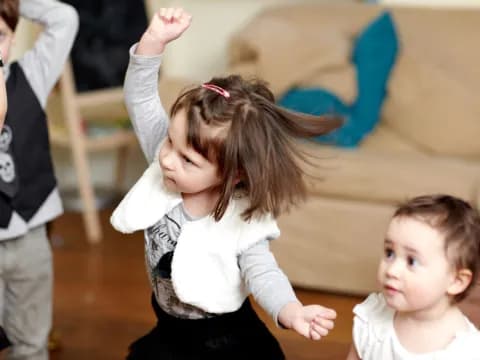 a girl with her arms up
