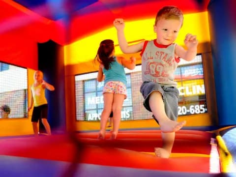 a boy jumping in the air