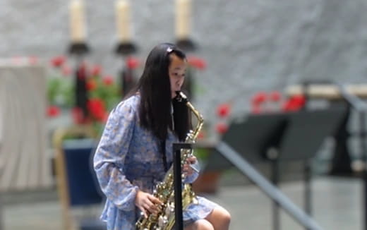 a person playing a saxophone
