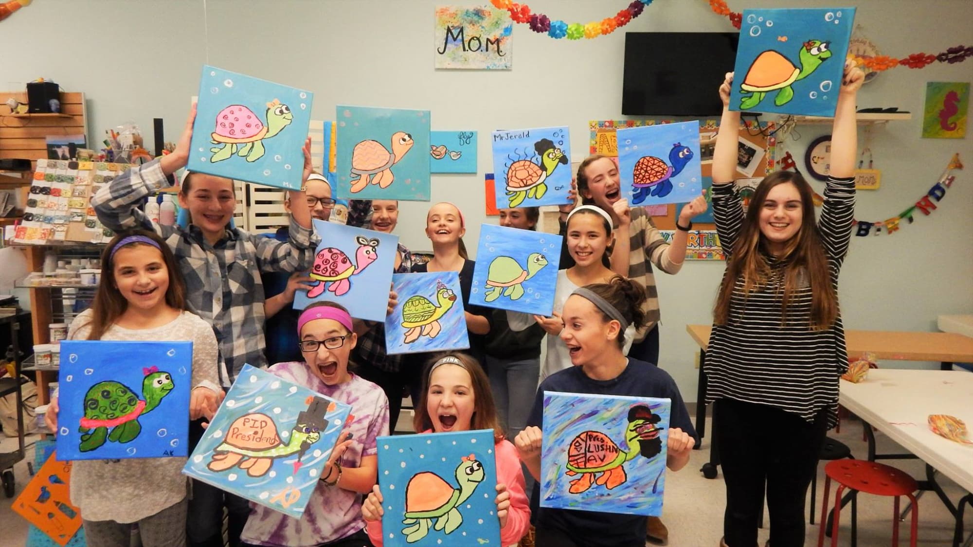 a group of people holding up signs