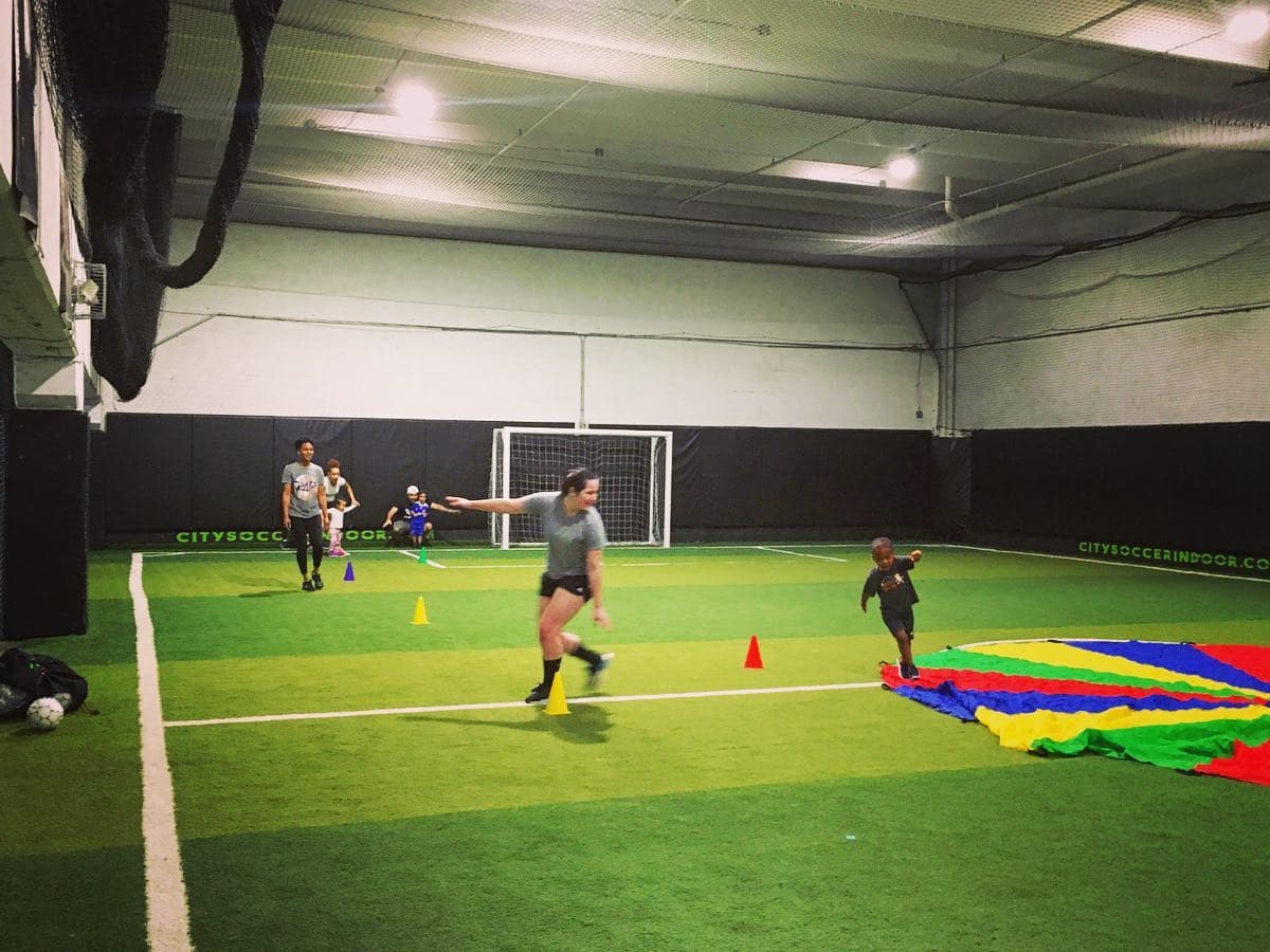 a group of people playing football