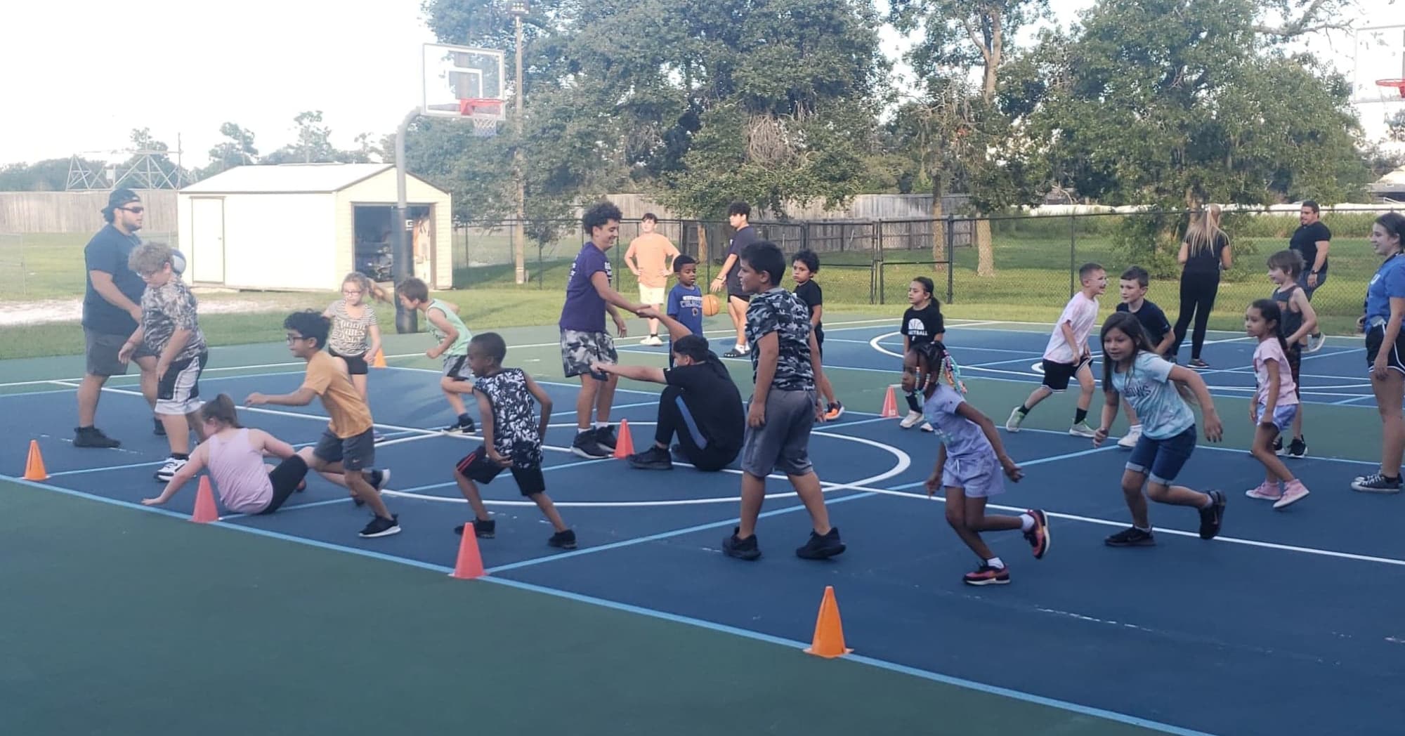 a group of people running on a track