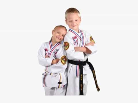 a few boys in karate uniforms
