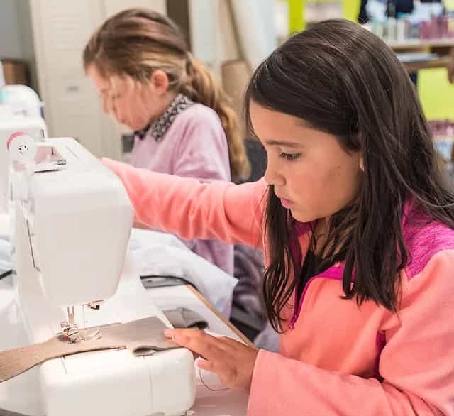 a person looking at a person in a pink coat