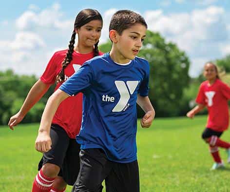 a group of people playing football